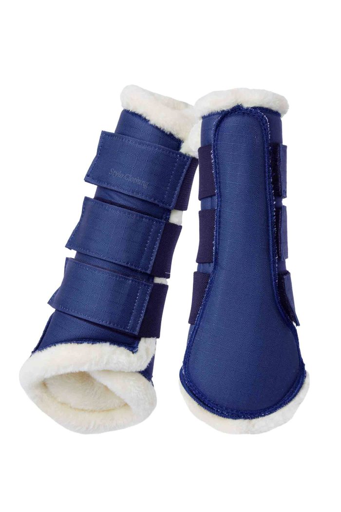 Faux fur-lined brushing boots providing comfort and style, perfect for bulk orders from Stylo Clothing, a trusted horse tack manufacturer.
